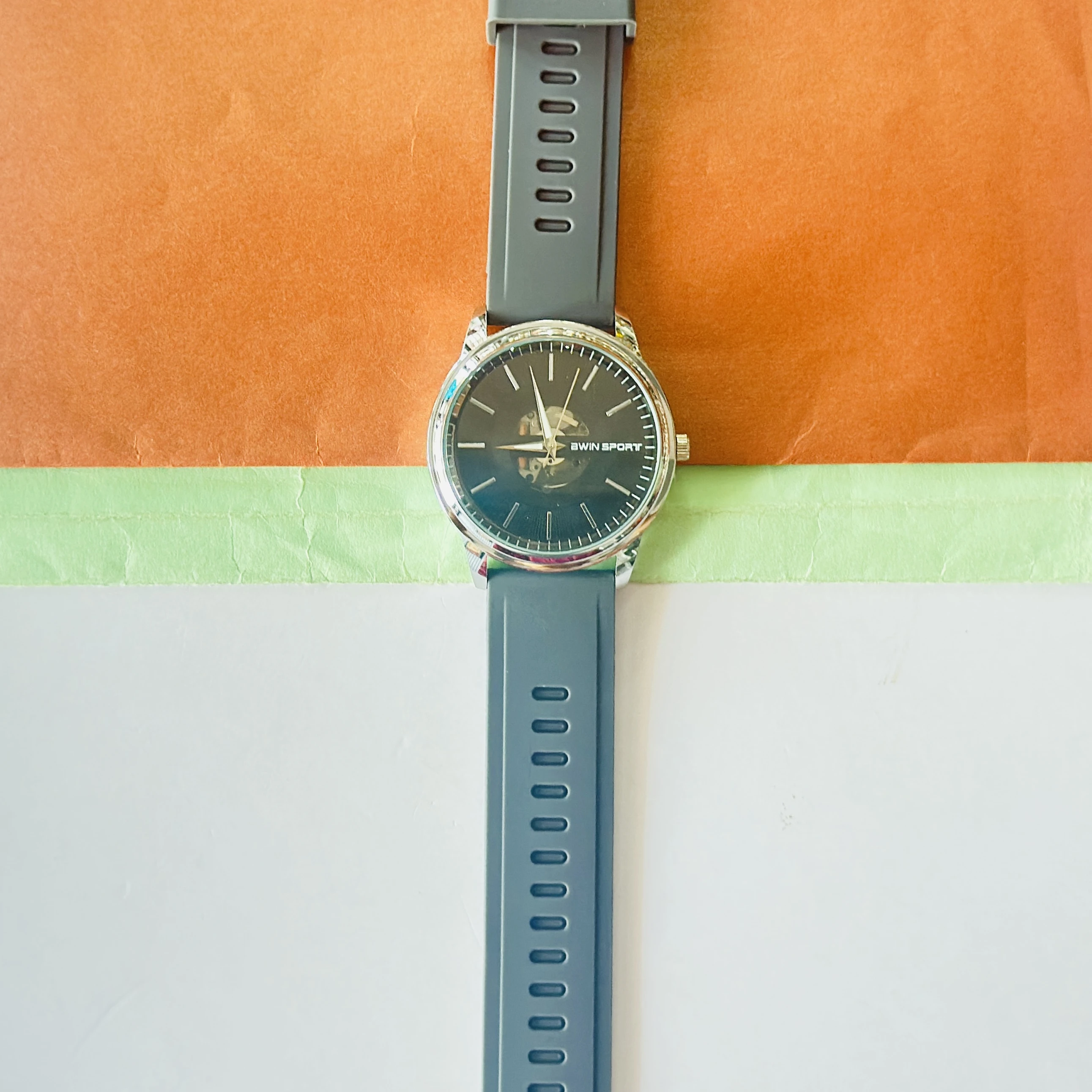 AWIN SPORT analog watch with a black dial and a grey silicone strap.