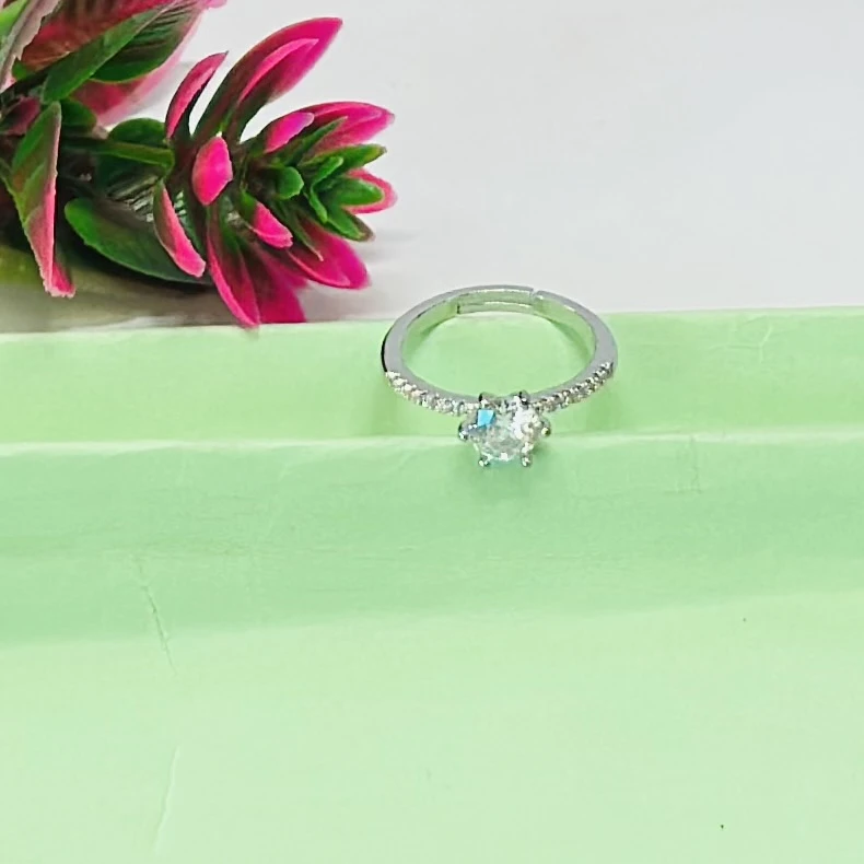 An adjustable silver-plated ring