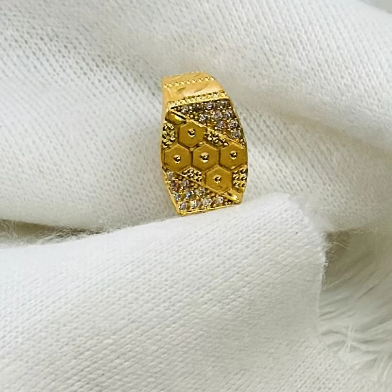 Gold men's ring with a hexagonal design and small white stones.