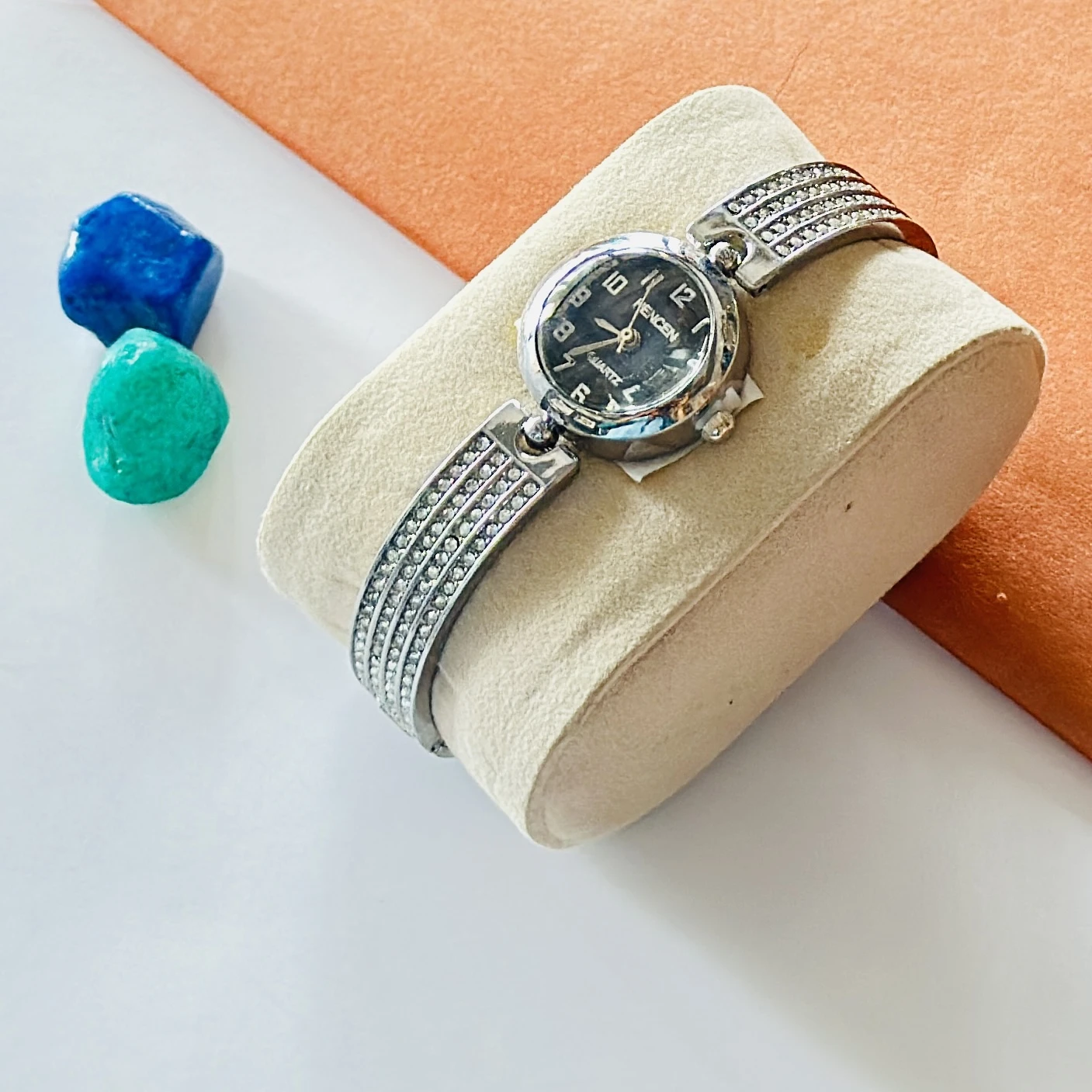 silver-toned women's quartz bracelet watch