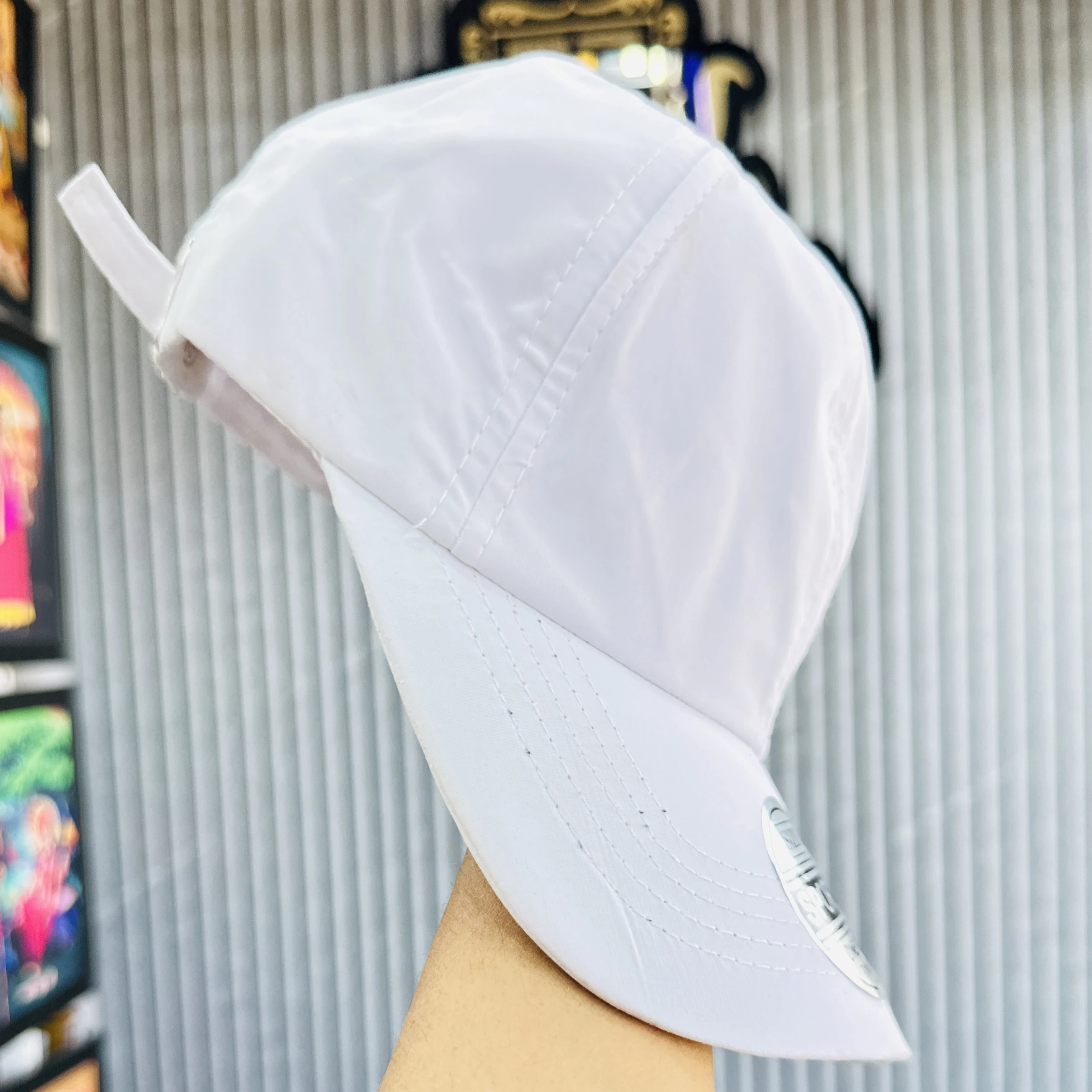 appears to be a white Nike branded baseball cap