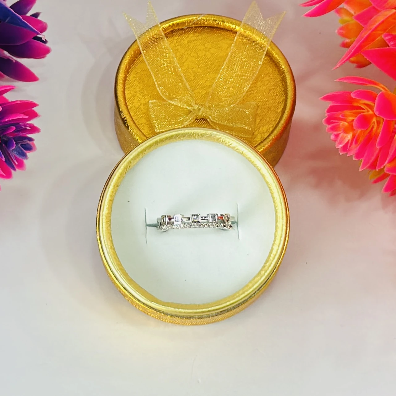 Silver multi-row American diamond band ring.