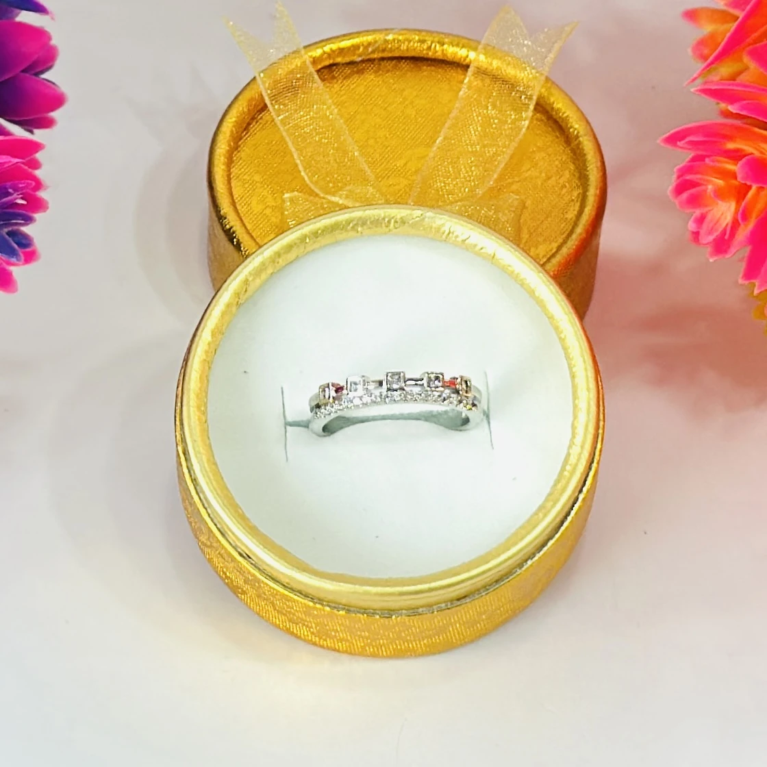 Silver multi-row American diamond band ring.