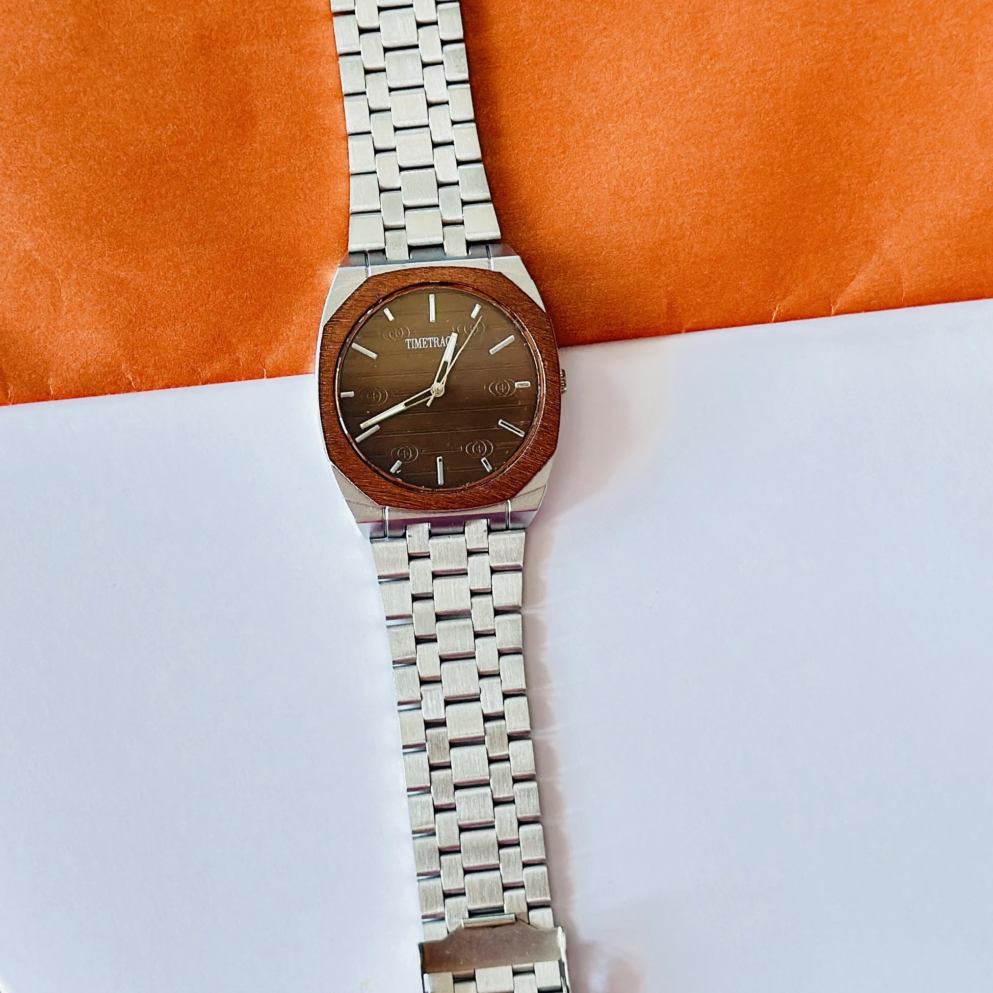 silver-toned stainless steel analogue watch