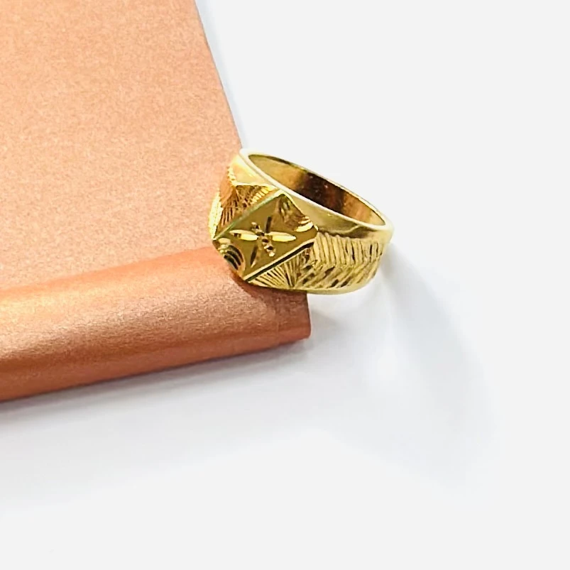 Men’s signet ring with a geometric design.