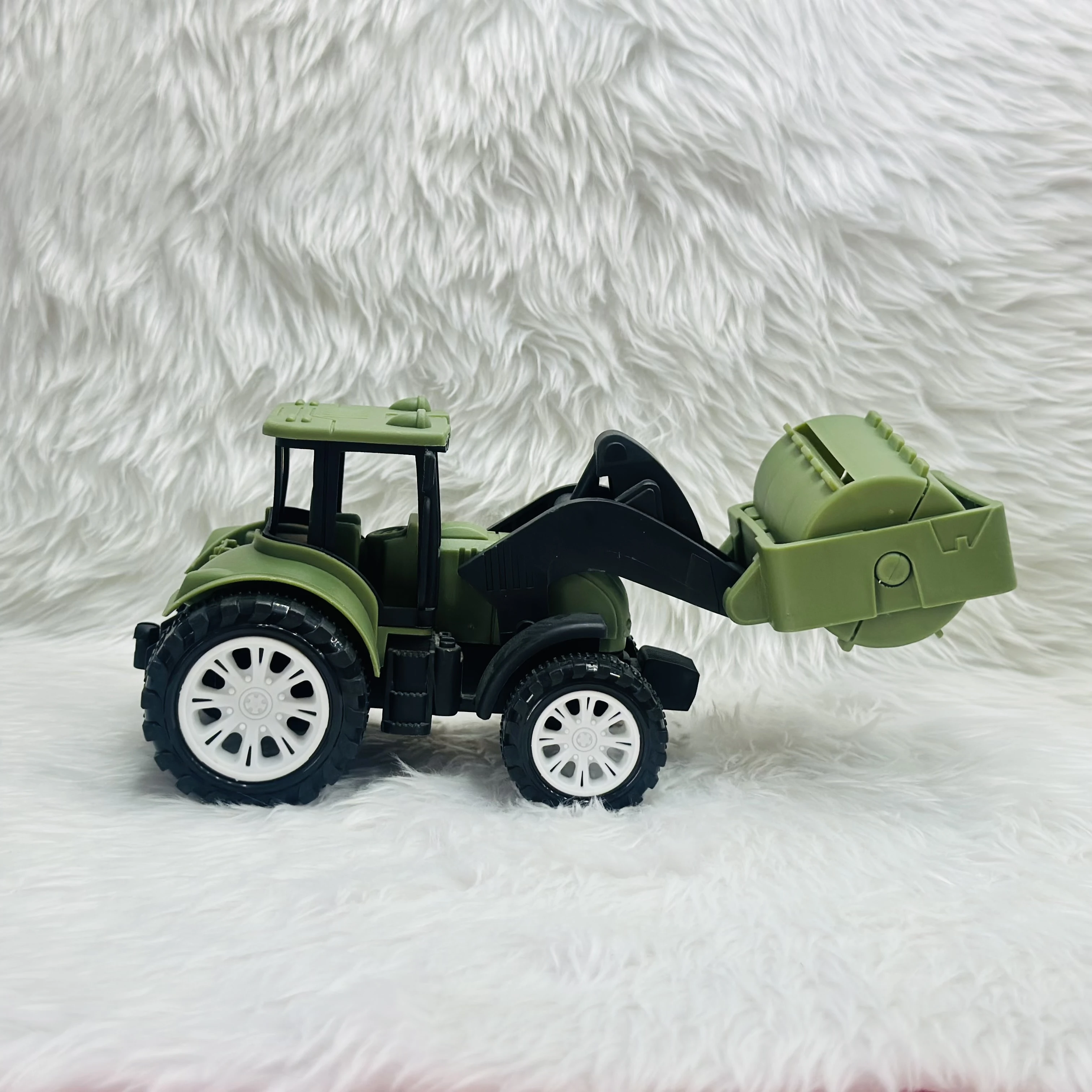 friction-powered road roller toy truck.
