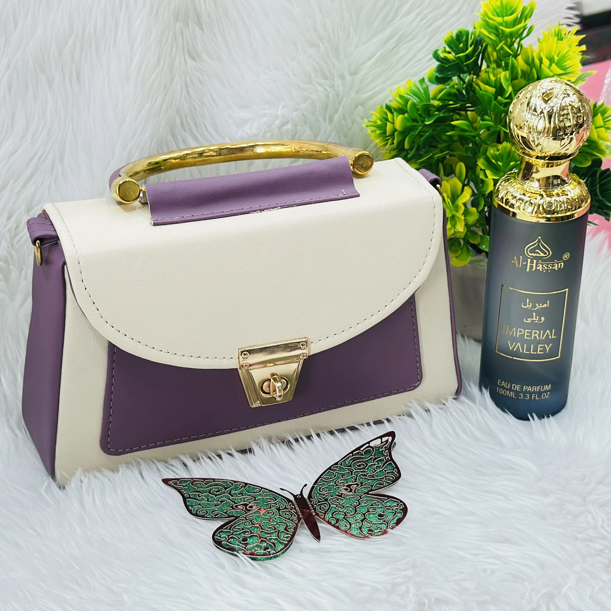 purple and cream top-handle handbag