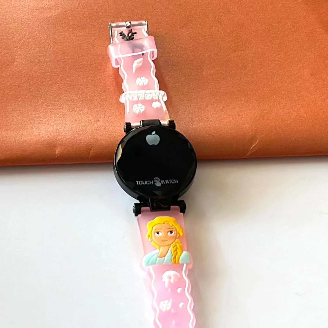Kids digital watch with a pink silicone strap