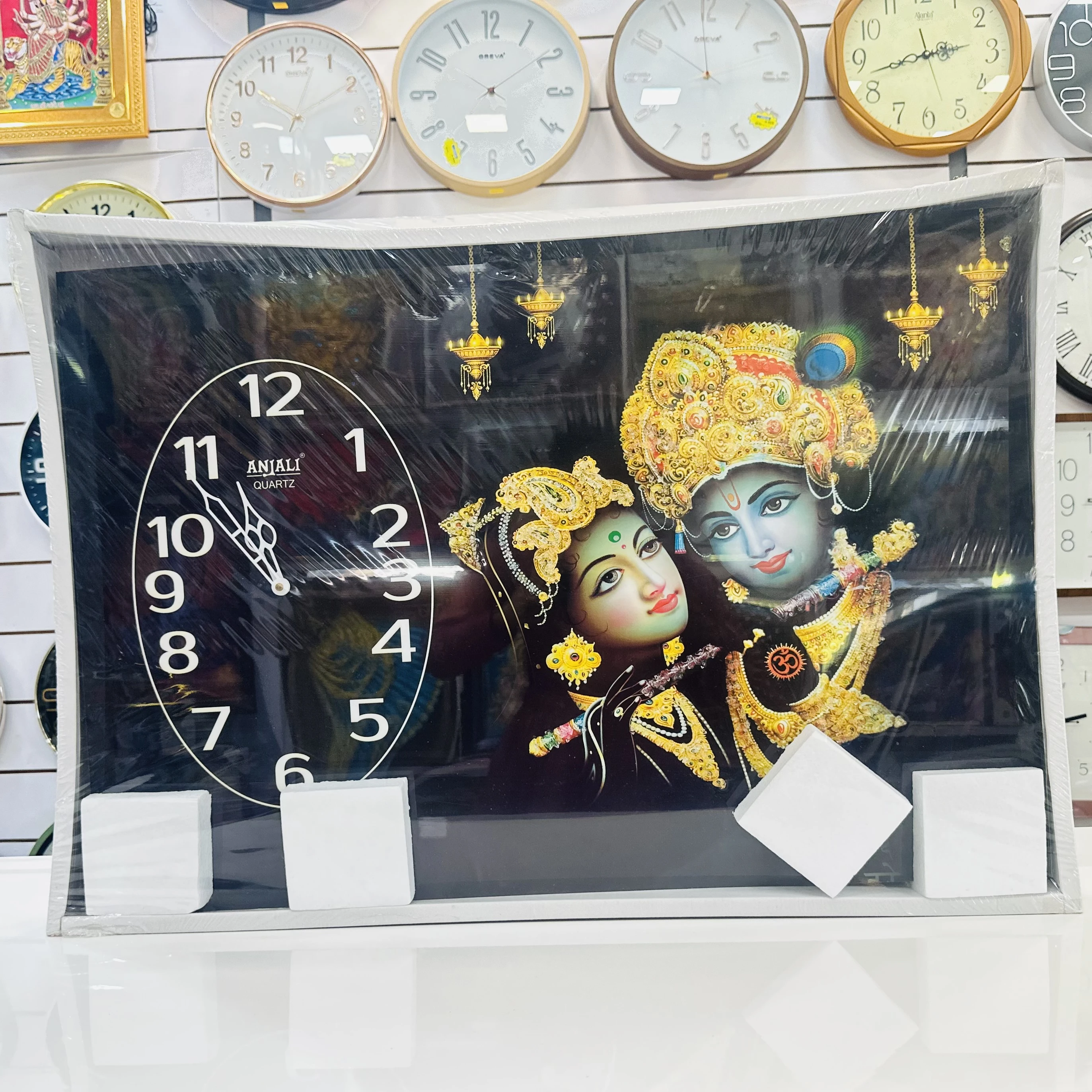 Radhe Krishna-themed wall clock(SKU-9ZC48M)