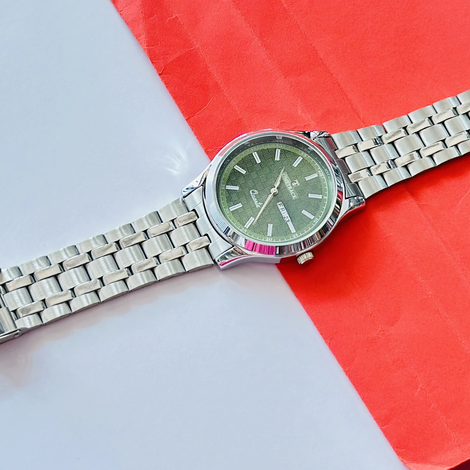 silver-toned stainless steel analogue watch