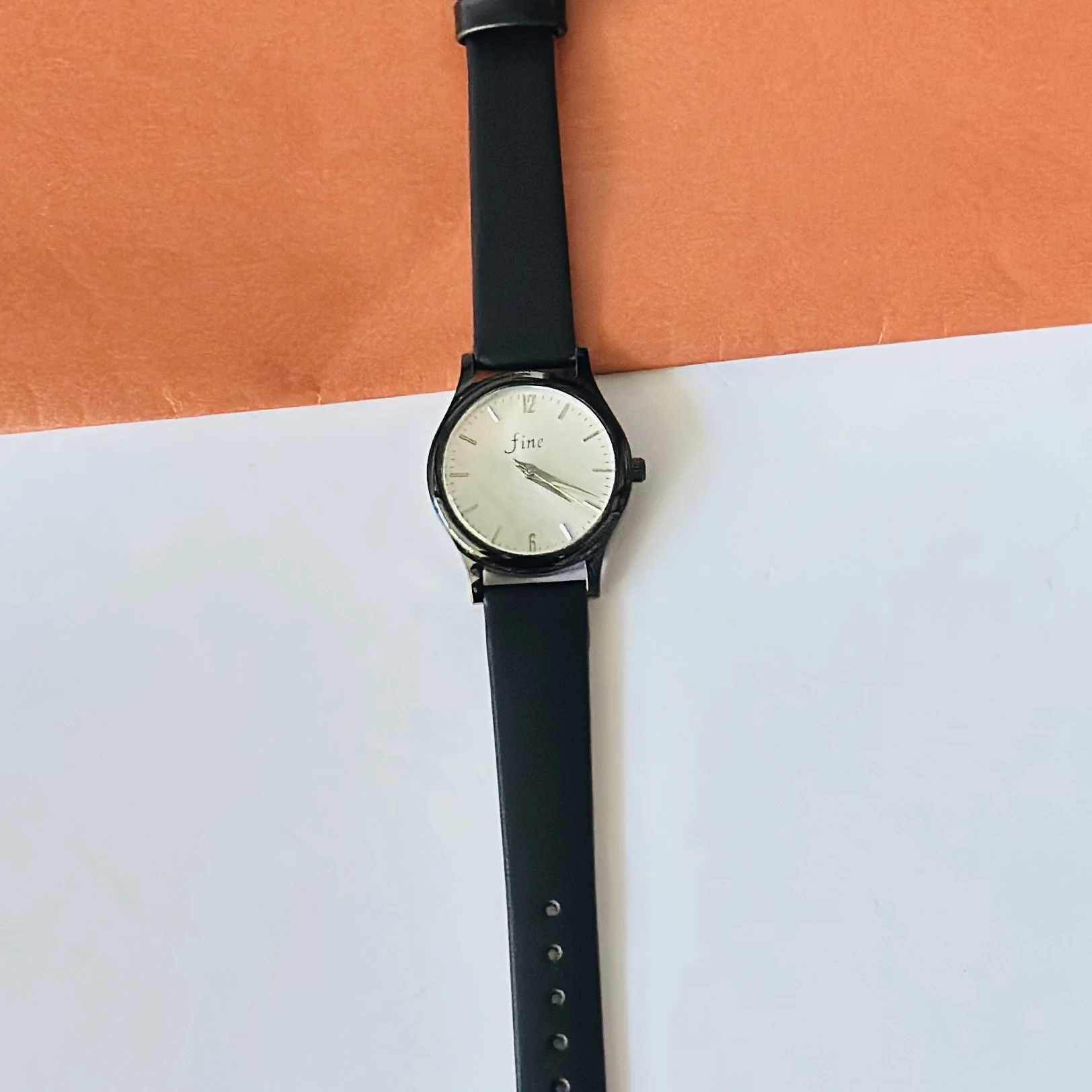 Watch City Jay Enterprise analog watch with a black leather strap.
