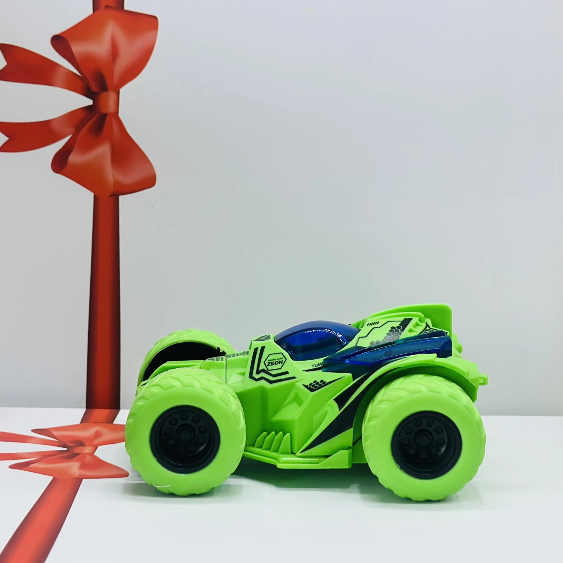 friction-powered toy stunt car