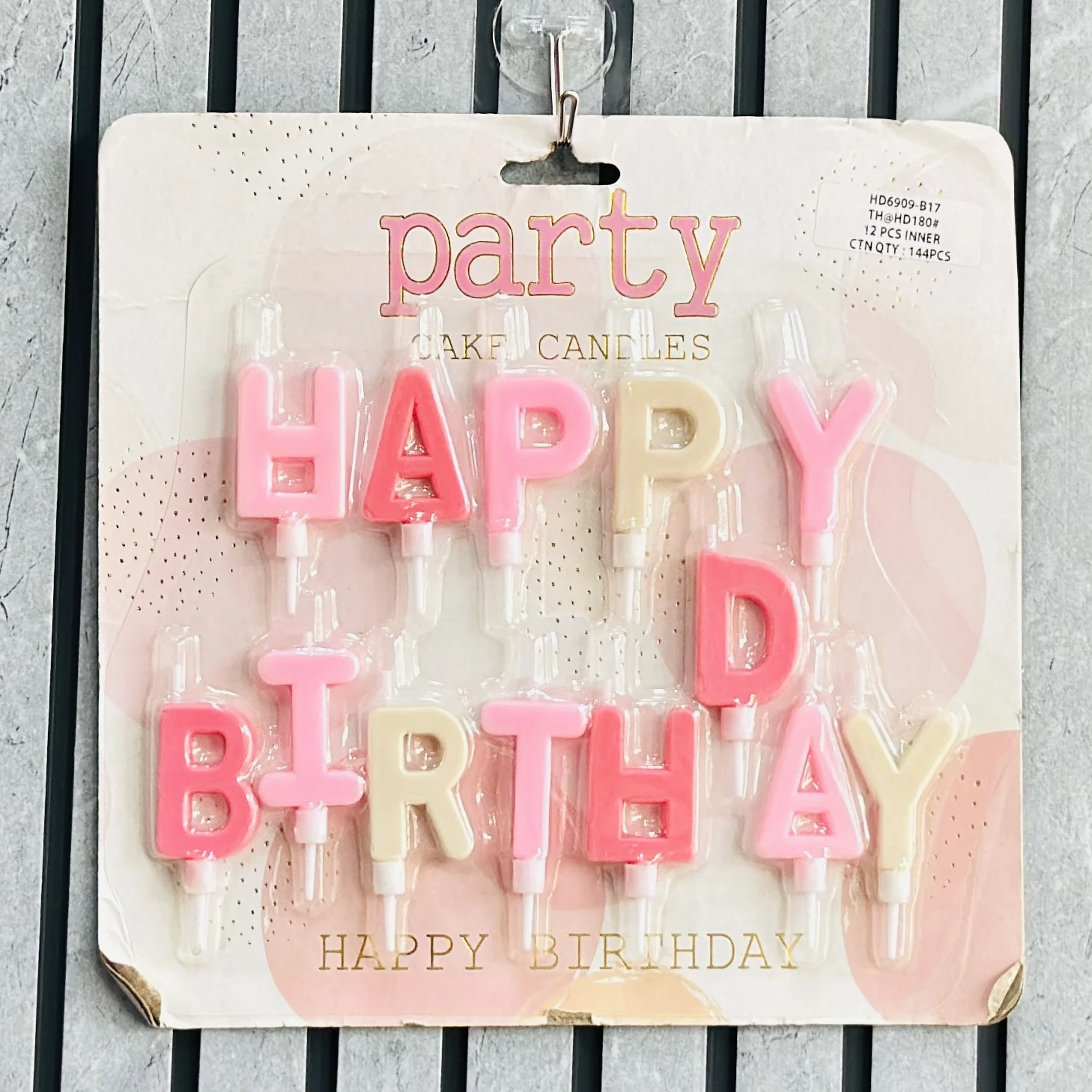 package of "Happy Birthday" cake candles.