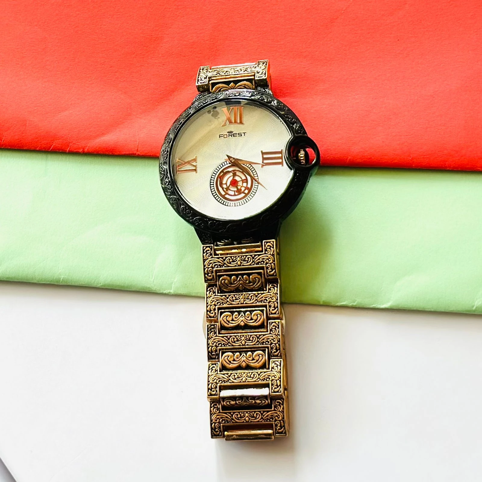 Forest Quartz Date watch with a gold-tone metal band