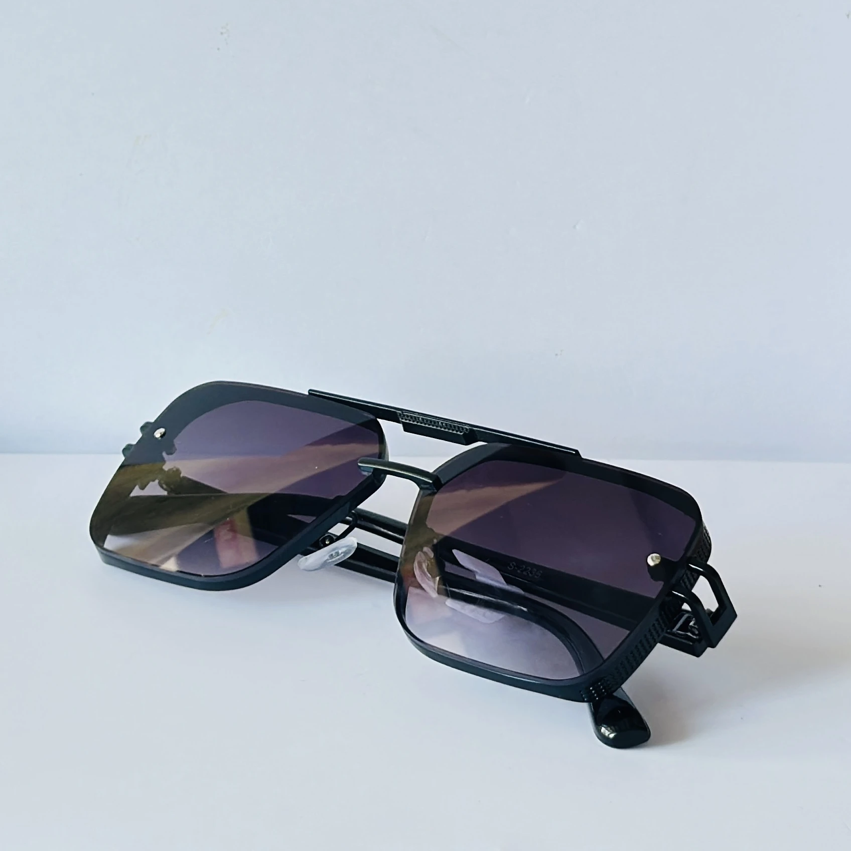 sunglasses are the Dita Mach-Six model,