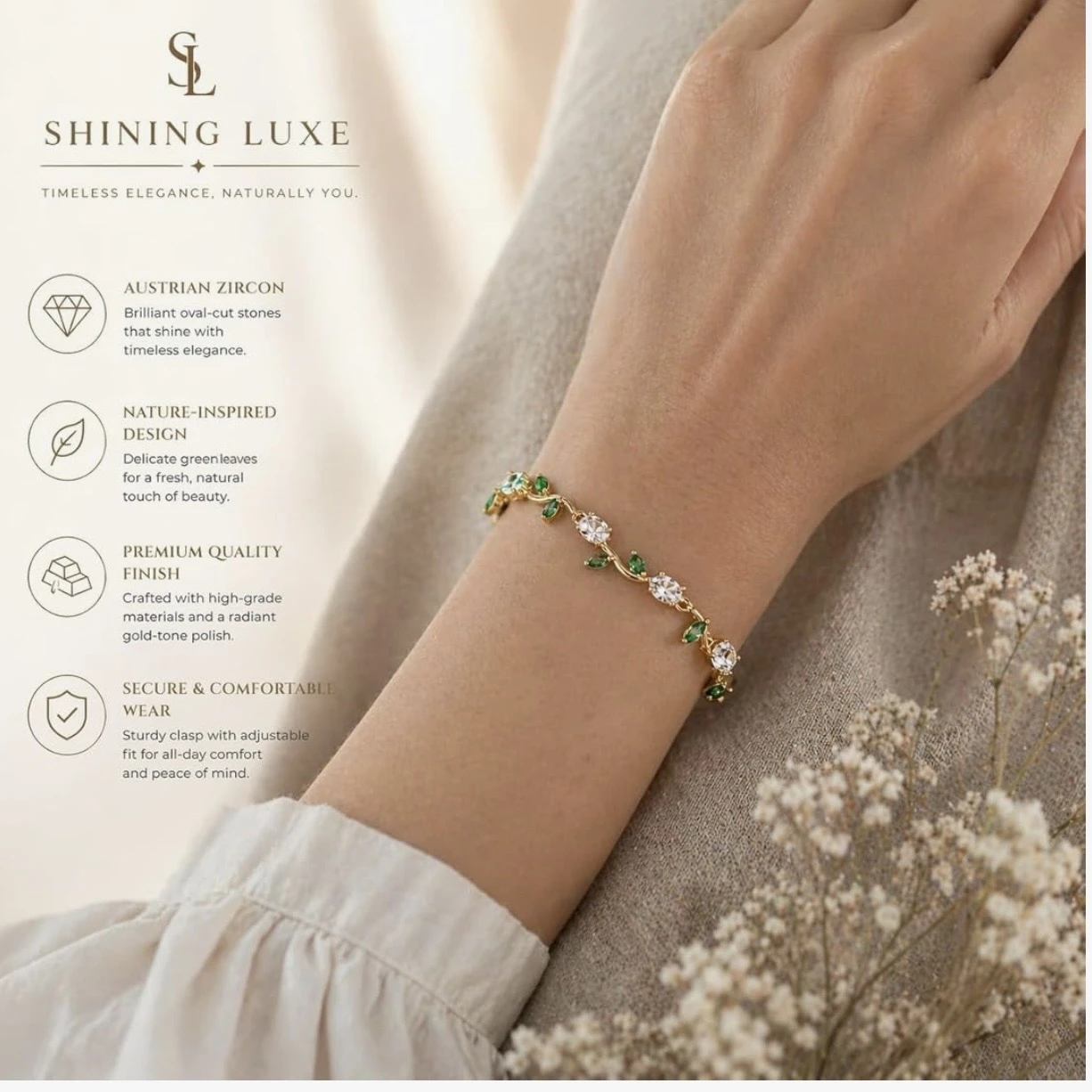 gold plated tulip bracelet featuring white oval crystals and green marquise leaf accents