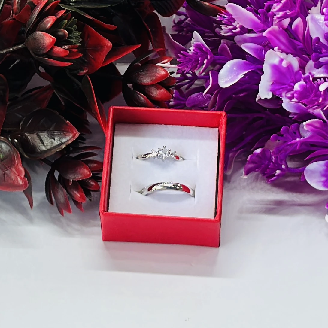 Set of rhodium-plated artificial couple rings