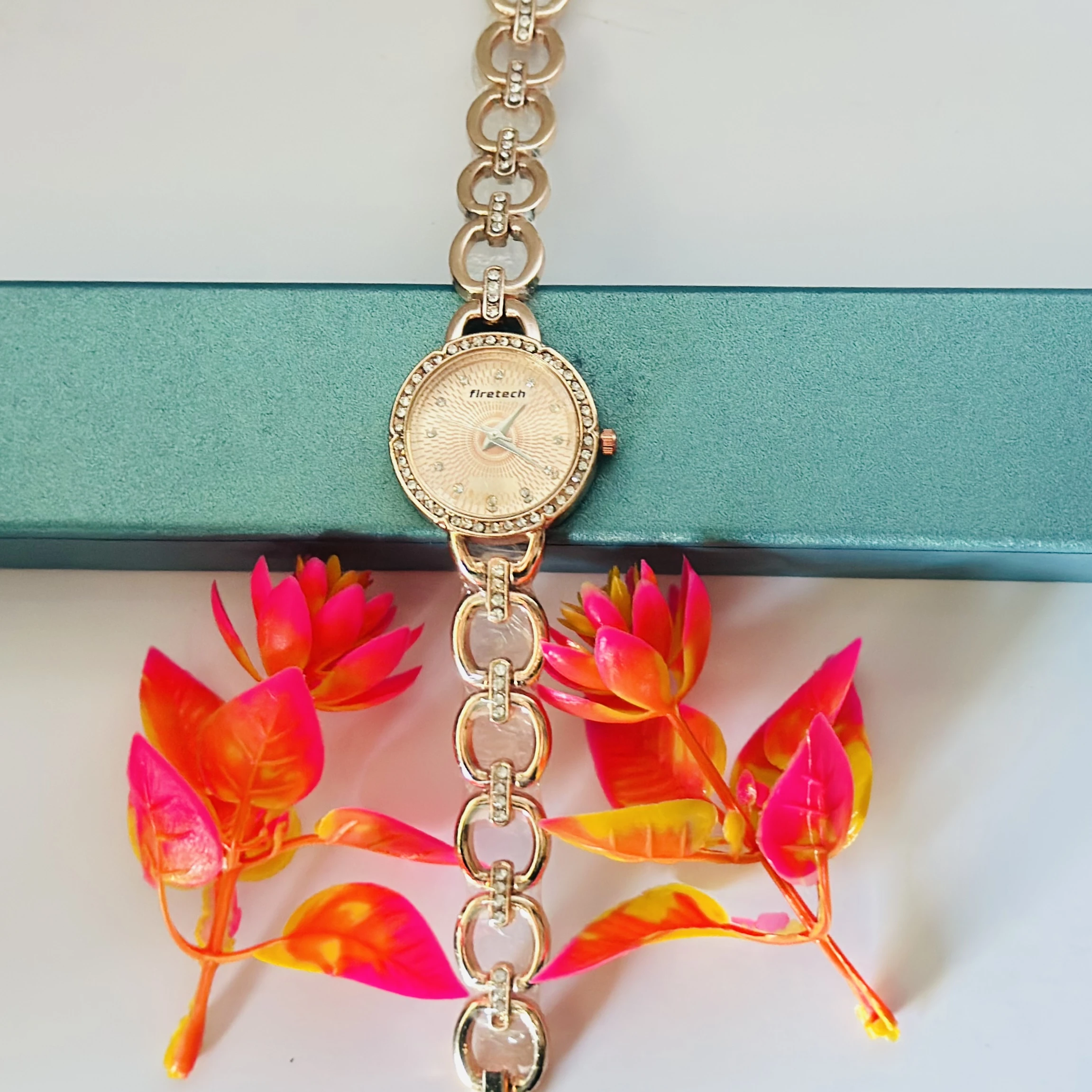 Rose gold-tone alloy bracelet watch