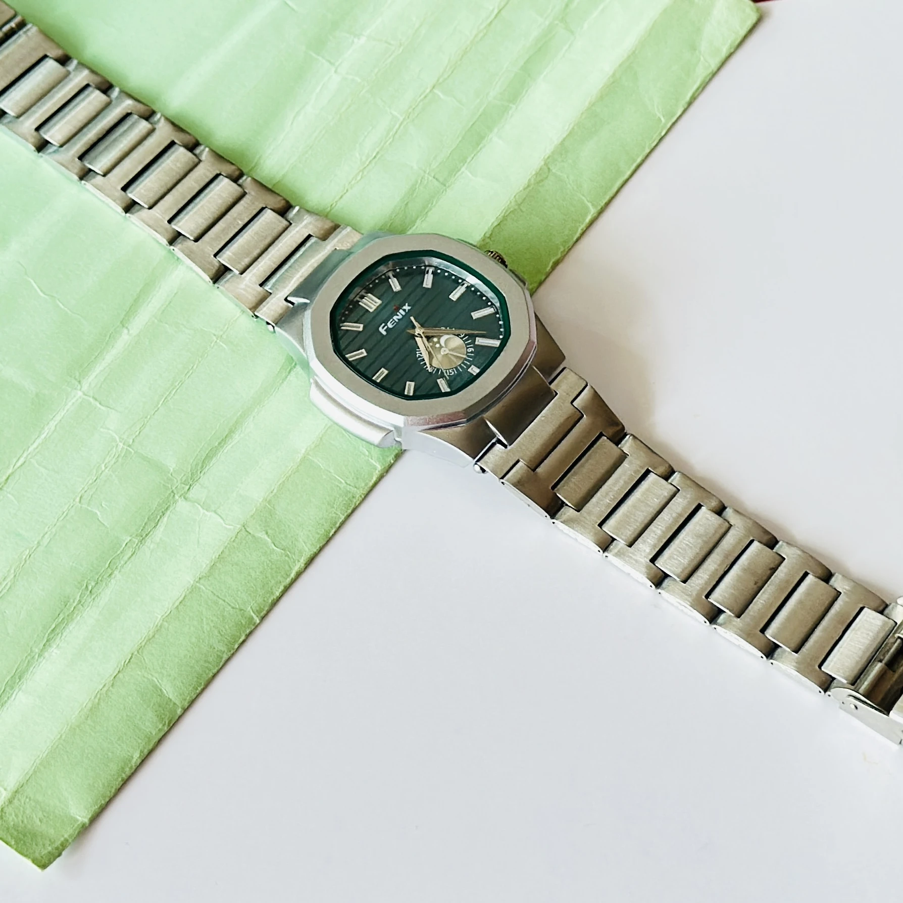 silver-toned stainless steel analogue watch