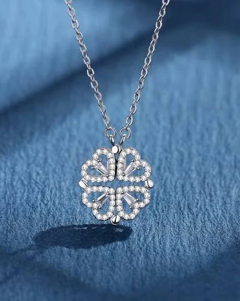 silver-toned, magnetic four-heart clover pendant necklace made of stainless steel