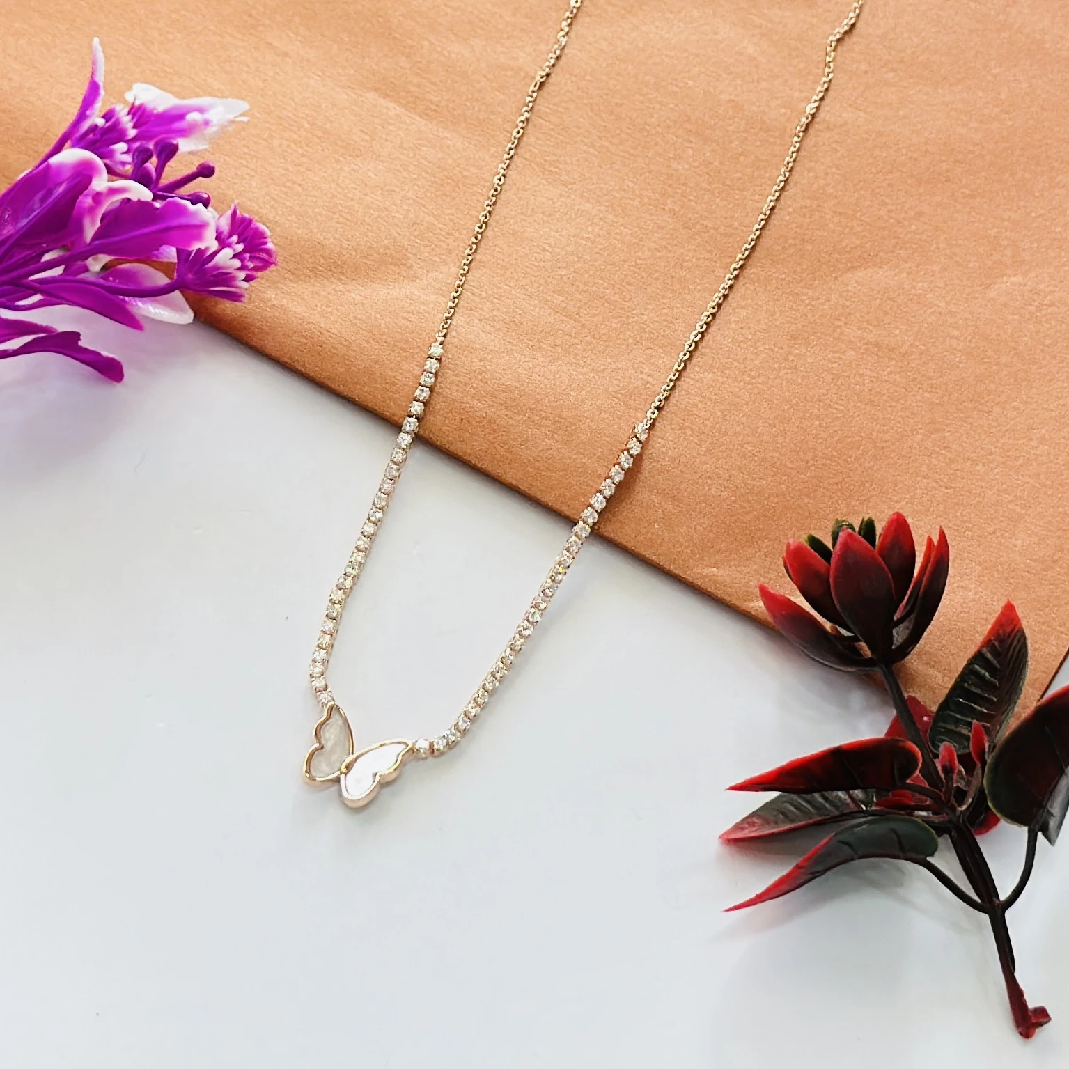 Gold tone butterfly pendant