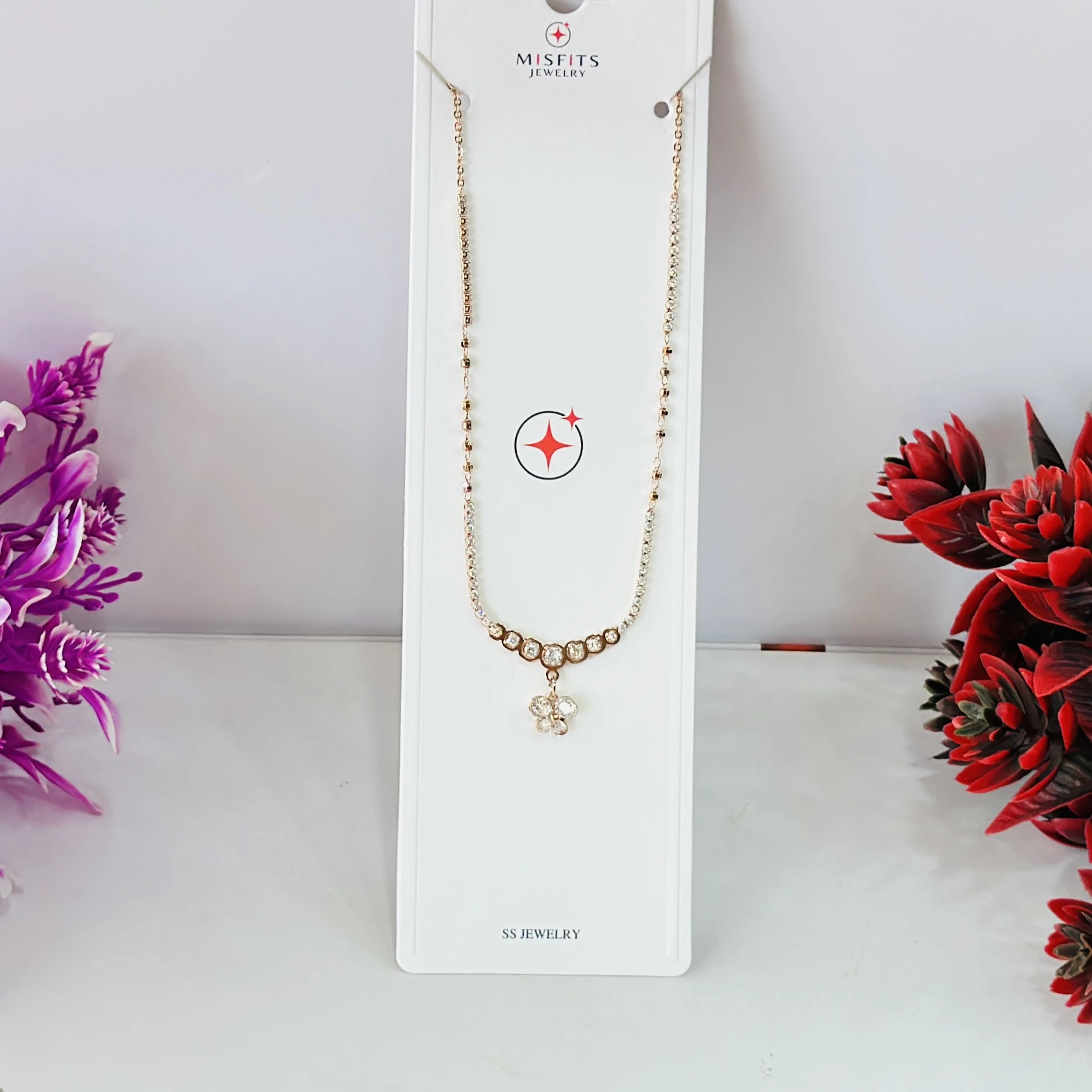Rose gold-plated sterling silver chain with a flower pendant