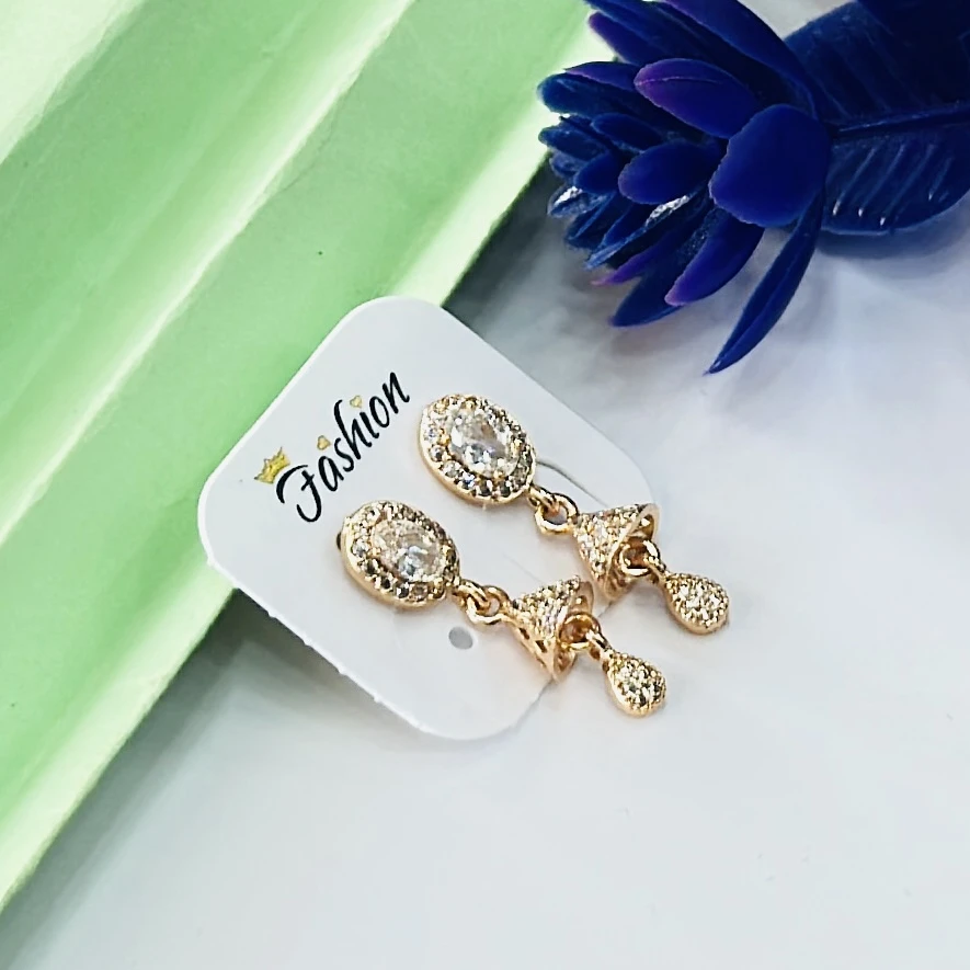 Gold toned jhumka earrings